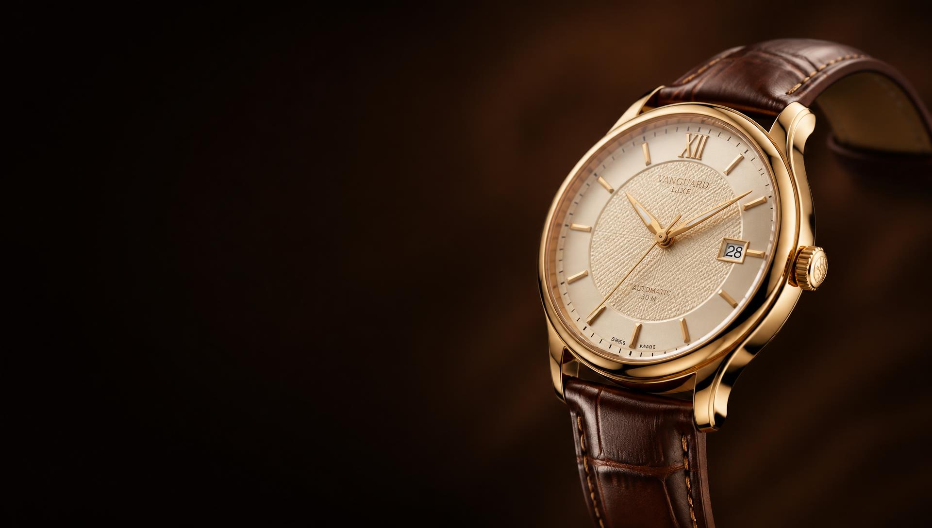Gold dress wristwatch with leather strap